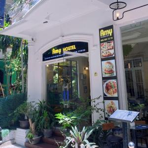 a restaurant with a sign that reads angry noise at Amy Hostel Hue in Hue