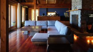 a living room with a couch and a table at Private beach retreat Resort villa iki by ritomaru in Iki +22 photos