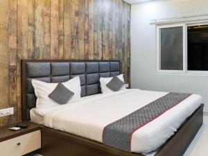 Voodi või voodid majutusasutuse Super Townhouse 1265 Hotel Rama toas