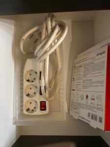 a refrigerator with a bunch of controllers in it at Downtown Tokyo/Taito-gu/2min walk nearest sta/Ueno/Wi-Fi/302 in Tokyo