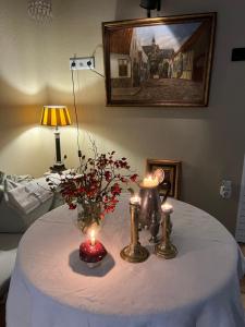 Postel nebo postele na pokoji v ubytování Das Kleine Hotel Schleiblick