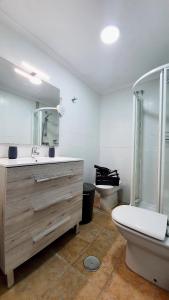 A bathroom at PALM TOWER APARTMENT