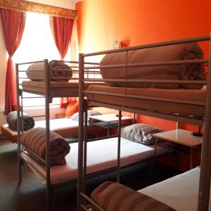 a group of bunk beds in a room at Doly 4 in Bouzov