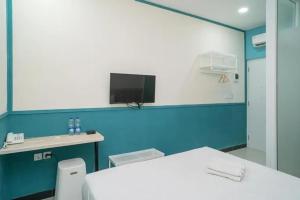 Een TV en/of entertainmentcenter bij Behomy 3C Residence near ICE BSD
