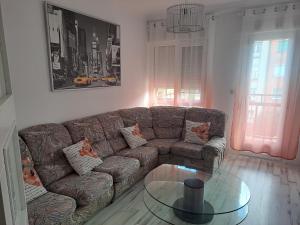 A seating area at Apartamentos El Conde
