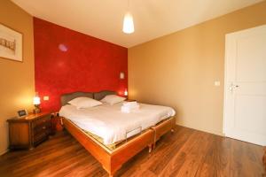 Posteľ alebo postele v izbe v ubytovaní La Pause annécienne appartement familial