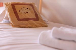 Posteľ alebo postele v izbe v ubytovaní La Pause annécienne appartement familial