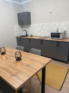 Kuchyň nebo kuchyňský kout v ubytování Жк Сезим кала бахыт + 2 fotografie