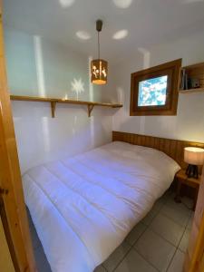 Ένα ή περισσότερα κρεβάτια σε δωμάτιο στο Appartement lumineux, 4 personnes, 2 chambres - OR11