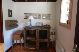 an old wooden desk in a room with a window at Chalet centre village, 8 personnes, 4 chambres - CH25 in Beaufort +9 photos