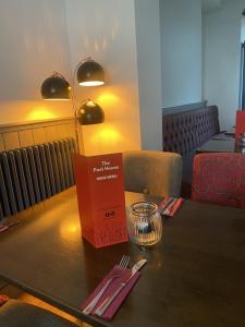 a table with a box on top of it at The Post House, Llandudno in Llandudno