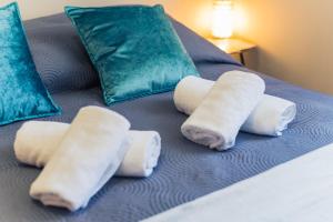 Posteľ alebo postele v izbe v ubytovaní Apartament w Kamienicy na Kłodzkiej