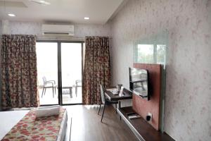 Kuchyň nebo kuchyňský kout v ubytování Hotel Pearls