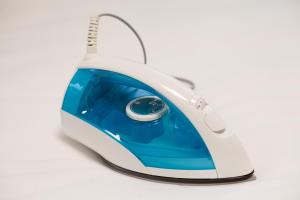 a white and blue computer mouse on a white background at Maison Roppongi in Tokyo