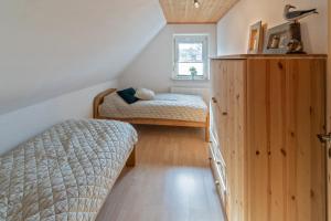 Postel nebo postele na pokoji v ubytování Möwenhaus