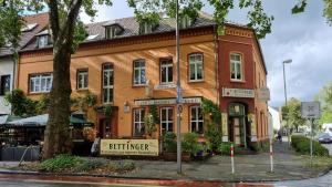a building on the corner of a street at Alpha Apartments in Krefeld