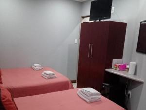 Postel nebo postele na pokoji v ubytování Grand Central Guesthouse