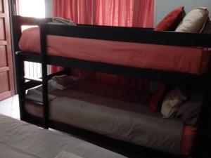 Postel nebo postele na pokoji v ubytování Grand Central Guesthouse