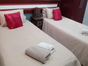 Postel nebo postele na pokoji v ubytování Grand Central Guesthouse