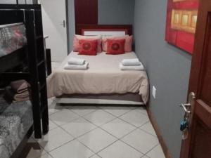 Postel nebo postele na pokoji v ubytování Grand Central Guesthouse