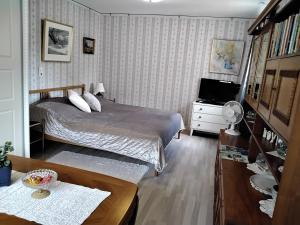 מיטה או מיטות בחדר ב-Bo i Trelleborg