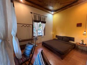 Giường trong phòng chung tại Chino Homestay Măng Đen