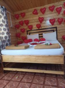 Ліжко або ліжка в номері Happy Shack Beach And Wooden Huts