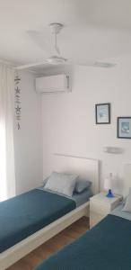 Posteľ alebo postele v izbe v ubytovaní Apartment IBIZA STYLE