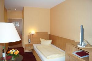 Katil atau katil-katil dalam bilik di Hotel an der Ilse
