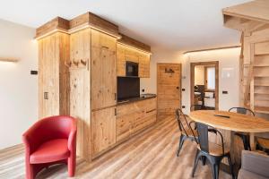 Kuchyň nebo kuchyňský kout v ubytování Chalet Leur Gusja Golp Trilocale