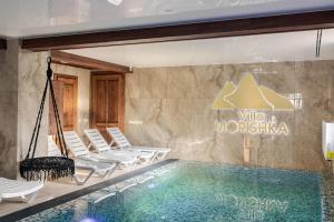 Bazén v ubytování Villa Morishka & SPA nebo v jeho okolí