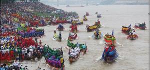 a group of people riding horses in the water at Somato Hotel in Phnom Penh