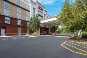 a rendering of a hotel with a parking lot at Hampton Inn & Suites Poughkeepsie in Spackenkill