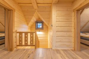 Vuode tai vuoteita majoituspaikassa Wellness Chalet Kohútka