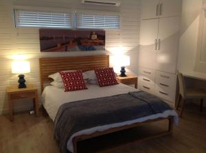 Łóżko lub łóżka w pokoju w obiekcie Tete Ferry Sun