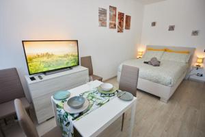 Μια τηλεόραση ή/και κέντρο ψυχαγωγίας στο Studio con vista, Pordenone Centro e Fiera +14 φωτογραφίες