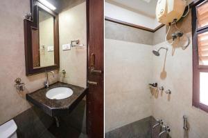a bathroom with a sink and a mirror at FabExpress MM Residency in Chennai