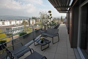 En balkong eller terrasse på Home on the roof w calm and tranquility