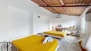 Ένα ή περισσότερα κρεβάτια σε δωμάτιο στο Azores Furnas Quinta Do Vale