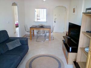 TV a/nebo společenská místnost v ubytování Ferienwohnung in Orihuela Costa - 3 Zimmer