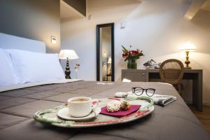 A bed or beds in a room at BB 22 Palace