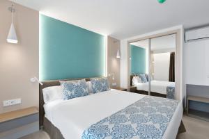 Posteľ alebo postele v izbe v ubytovaní Feelathome Tortuga de Mar