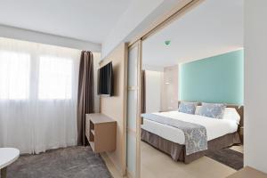 Posteľ alebo postele v izbe v ubytovaní Feelathome Tortuga de Mar