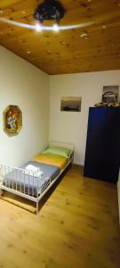 Katil atau katil-katil dalam bilik di Accogliente appartamento Anzola dell' Emilia