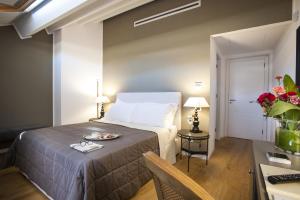 A bed or beds in a room at BB 22 Palace