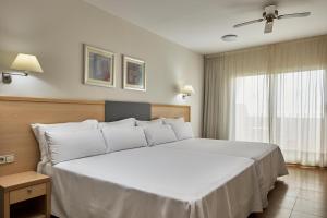 Postel nebo postele na pokoji v ubytování ALEGRIA Cabo De Gata