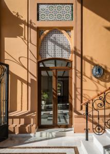 an entrance to a building with a glass door at ALEGRIA Palacio Mojacar - Adults Only in Mojácar