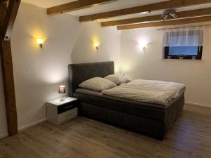 Postel nebo postele na pokoji v ubytování Ferienwohnung "Am Mittag"