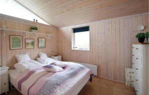 Ένα ή περισσότερα κρεβάτια σε δωμάτιο στο Two-Bedroom Holiday Home In Juelsminde +2 φωτογραφίες