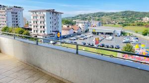 a view of a city with a parking lot at Apartament Dem Rădulescu Lidl in Râmnicu Vâlcea